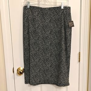 L Simply Styled black w/ white polka dot skirt